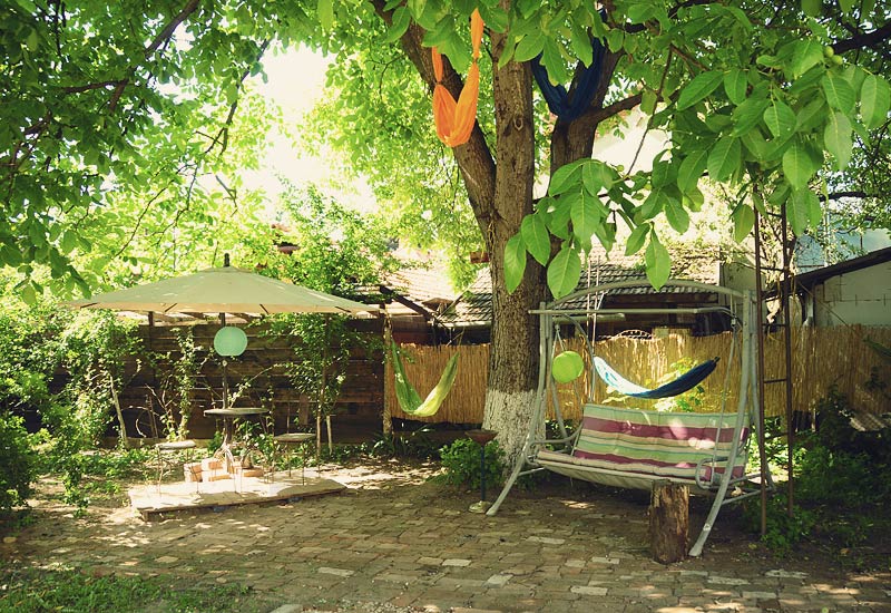 The Green Hostel Garden - which hammock do you choose? The ones in the tree?