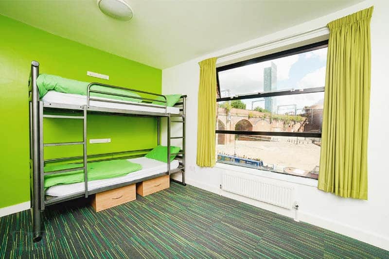 Rooms with a view? Sure! The YHA Hostel has some cool dorm views