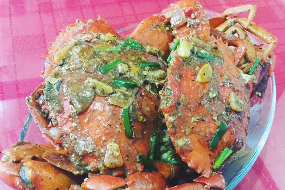 Try chili crabs in Singapore, a delicacy