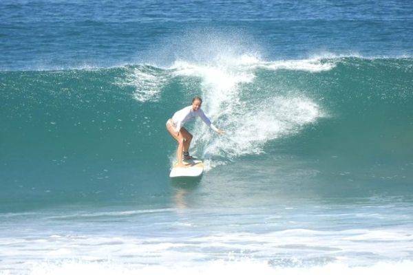Surfing at Pura Vida Surfers