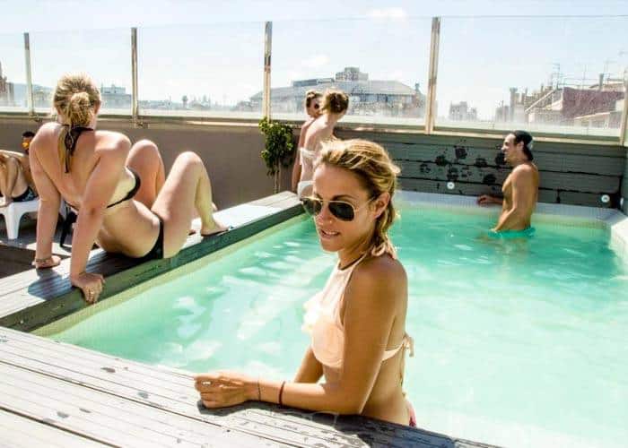 Kick back at the swimming pool of Sant Jordi Hostel after a long night out