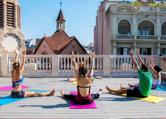 Roof Top Yoga: You can actually join Yoga classes over the roofs of Barcelona: Hostel Sant Jordi Rock Palace