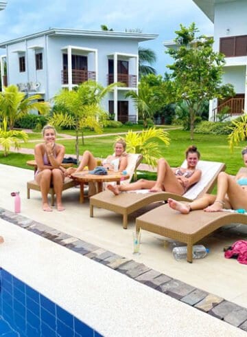 Relax by the pool at Red Picnic Hostel